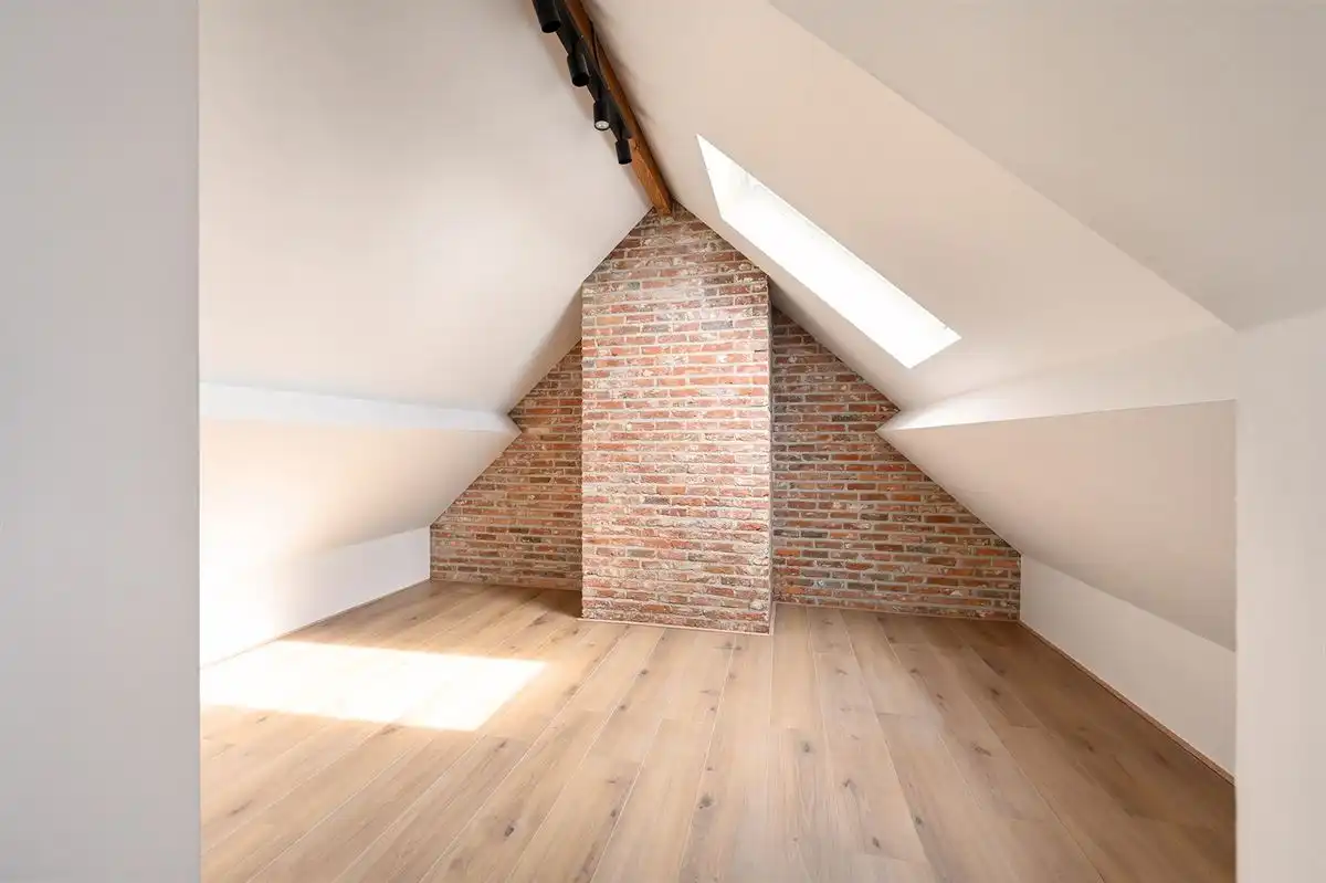 Uniek dakkappartement met zeer grote garage foto 14
