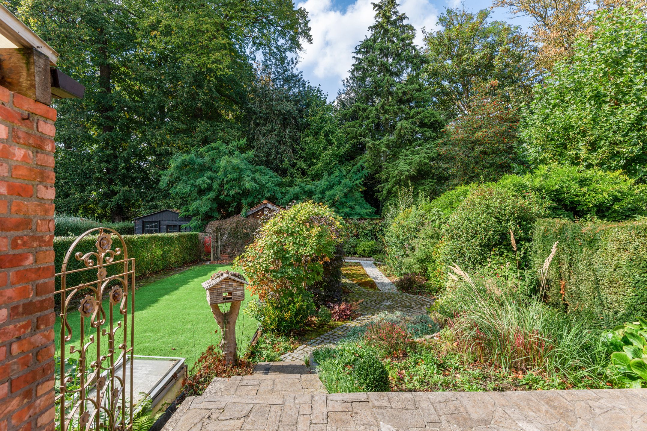 Mooie woning met appartement op toplocatie - mooie tuin foto 10
