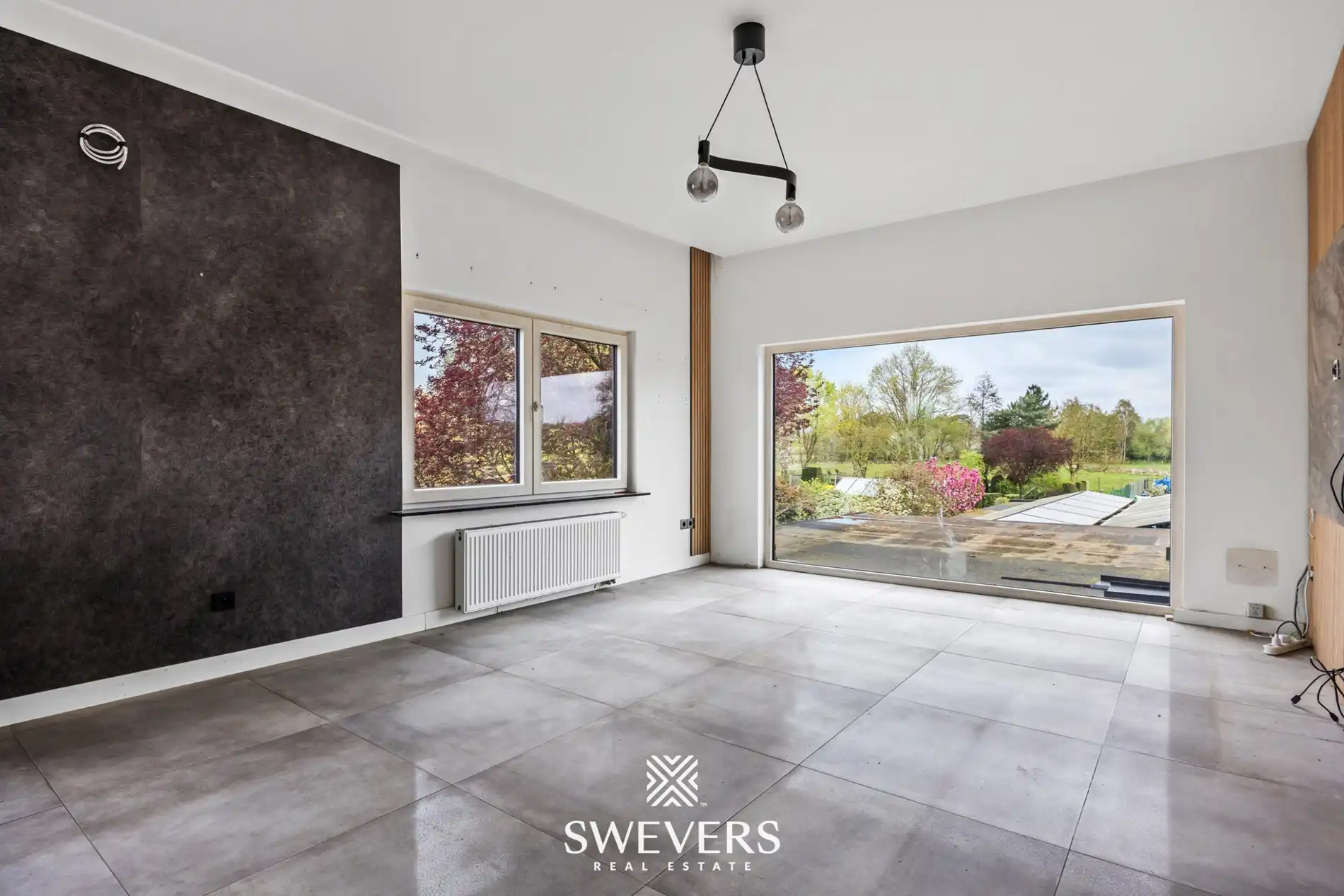 Ruim appartement met gemeenschappelijke tuin te Lummen foto 2