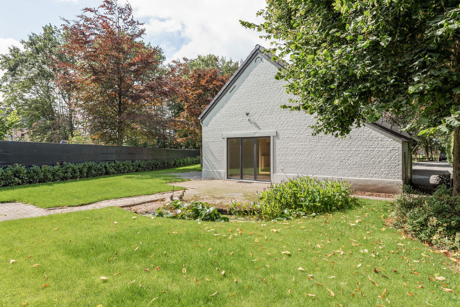 Gerenoveerde hoeve op 1313 m² met inrijlaan. foto 15