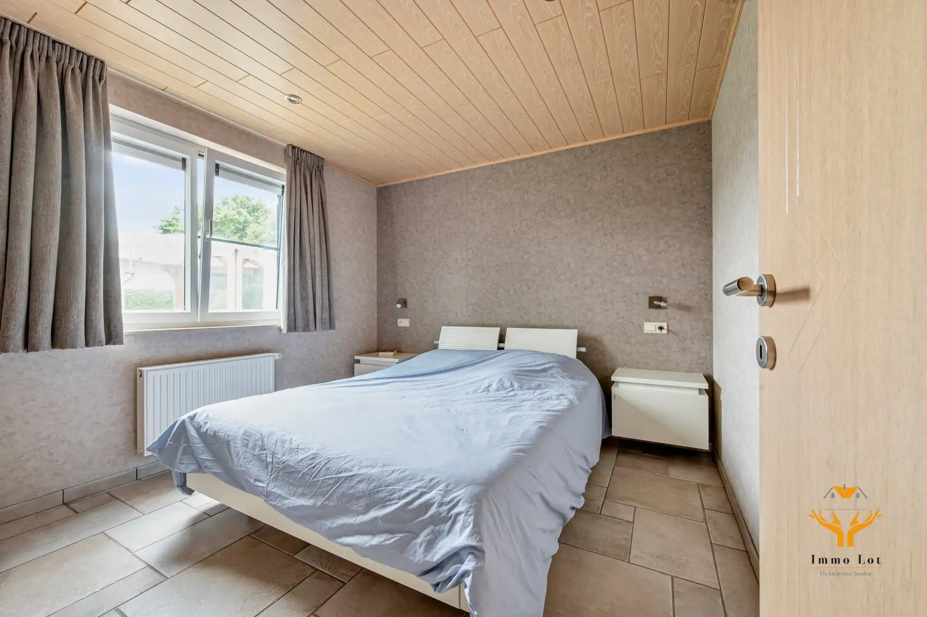 Instapklaar gelijkvloers appartement met tuin en garage foto 13