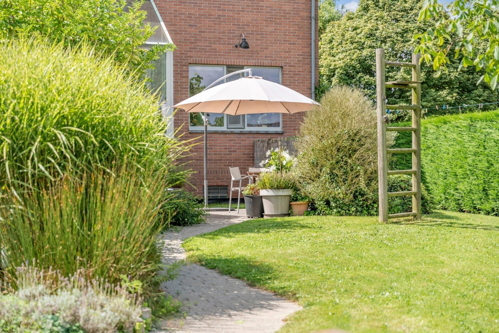 Knap ingerichte villa op heden bestemd als meergezinswoning met prachtige tuin op 20a 21ca, vlakbij het centrum van Bilzen foto 29