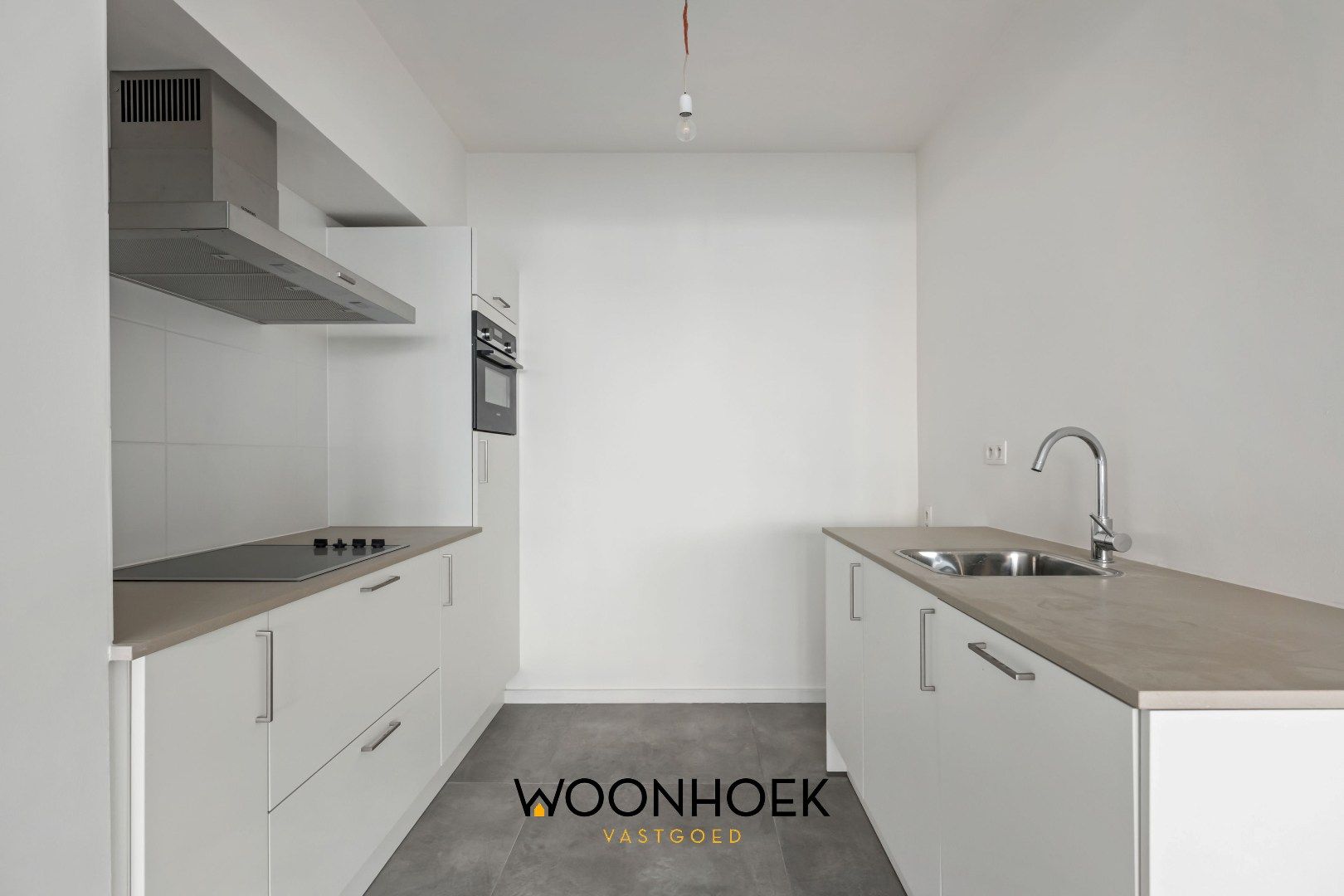 Gerenoveerd appartement op toplocatie te Belsele! foto 5