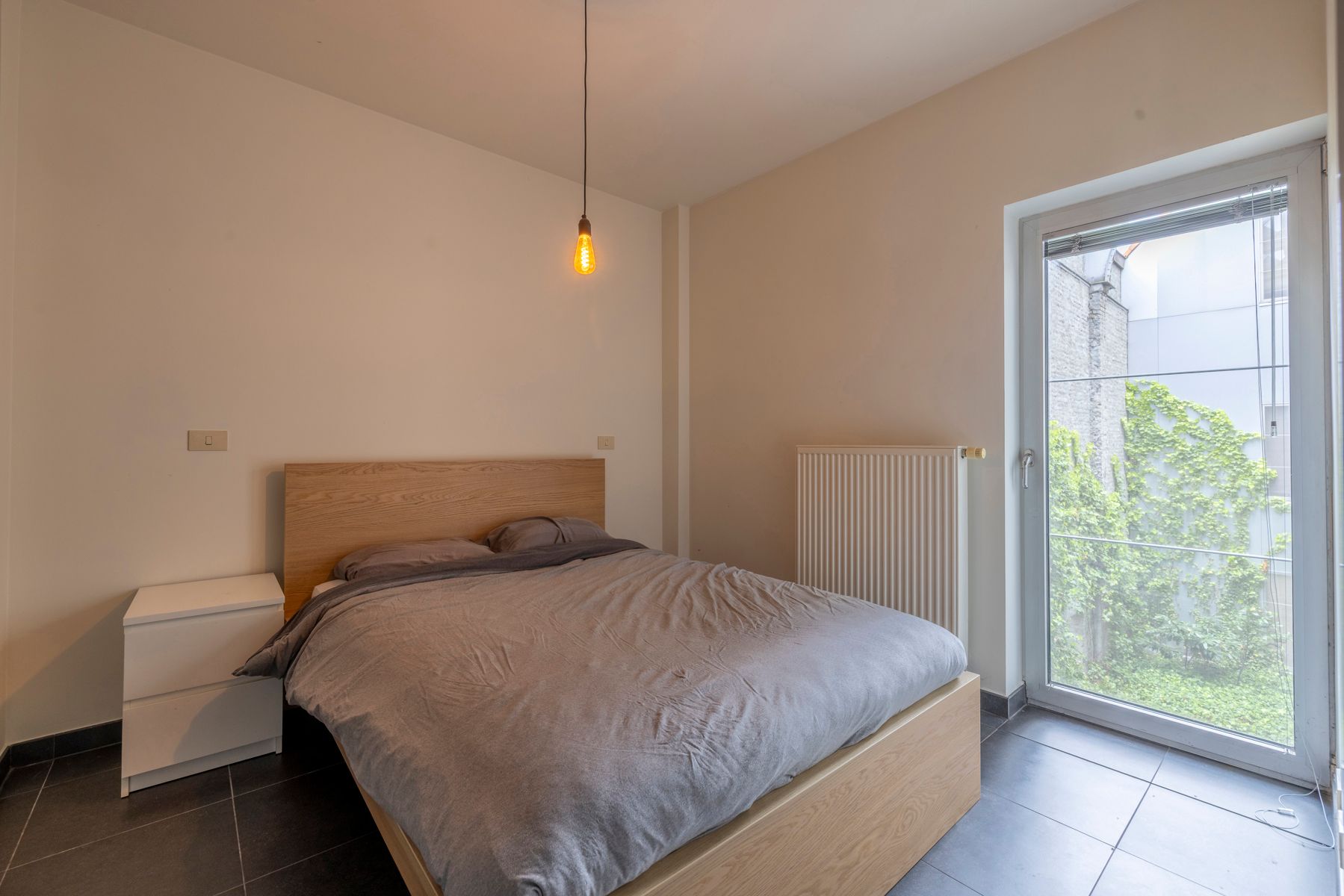 Appartement met 2 slpks, binnenstaanplaats en groot terras! foto 11