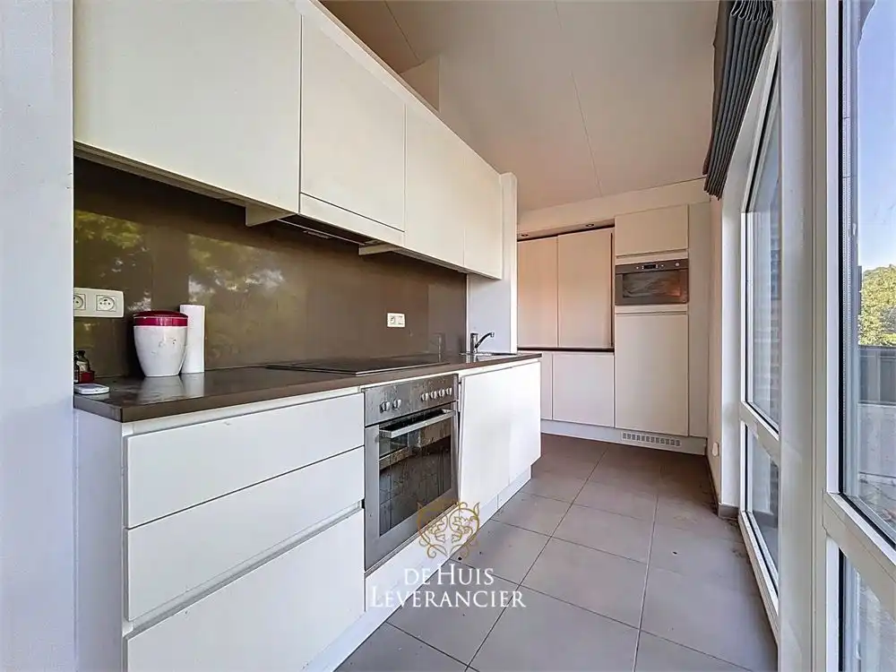 Luxueuze serviceflat met 1 slk en ruim terras foto 2