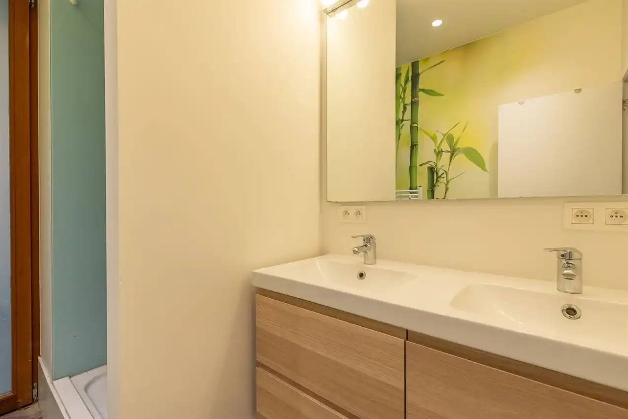 Ruim gelijkvloers appartement met zonnige tuin op toplocatie foto 23
