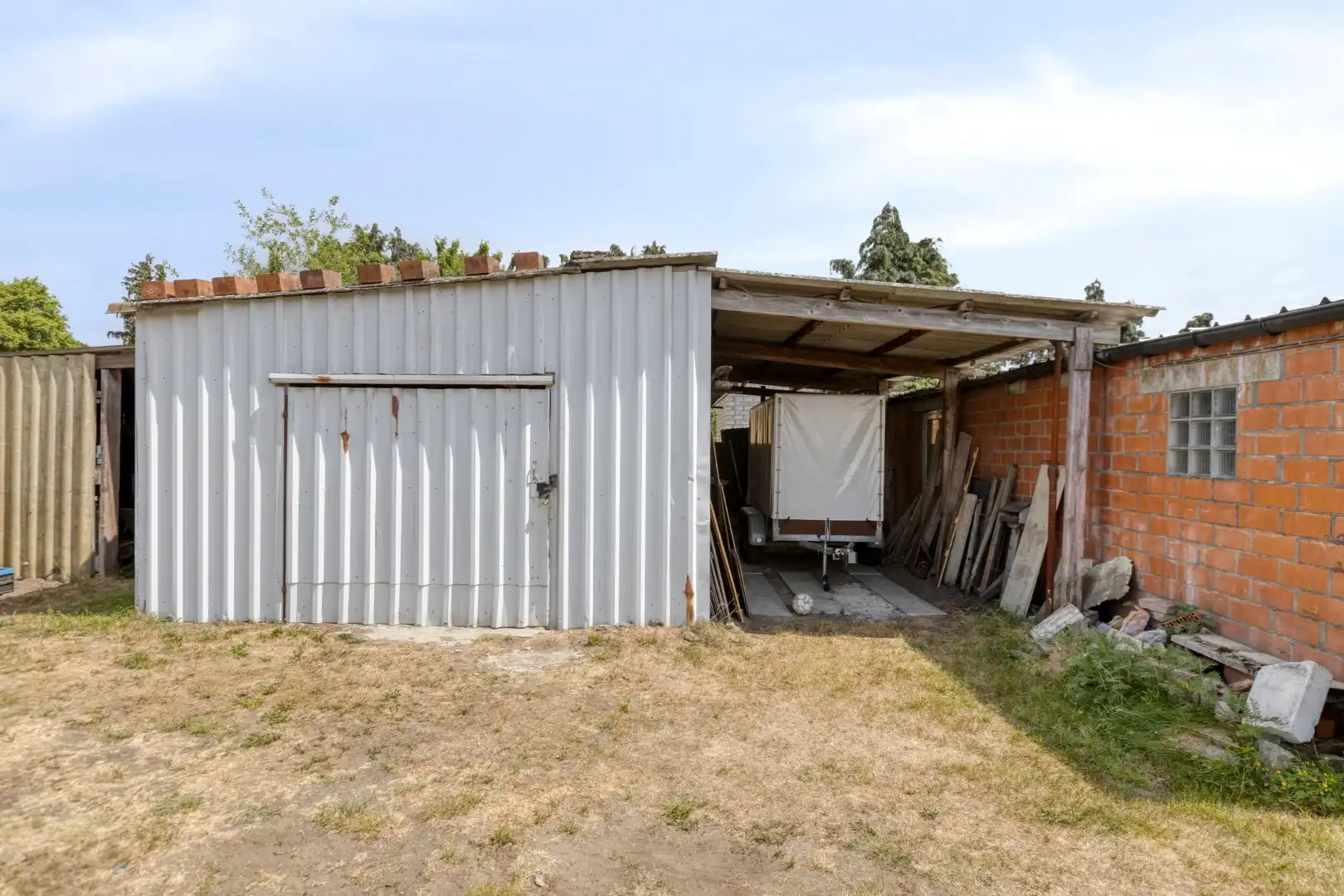 Bouwgrond van 674 m² met af te breken woning in een doodlopende straat te Ginderbuiten ! foto 23