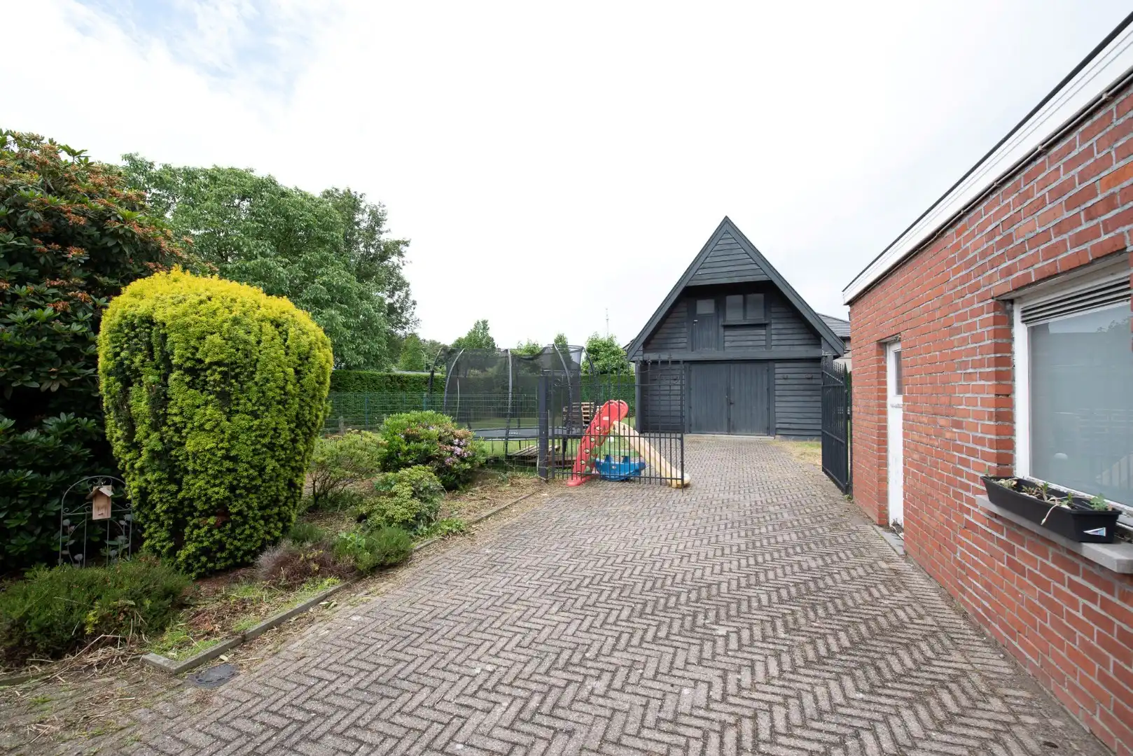 Charmante, halfopen bebouwing op 978 m² te koop in Zulte! foto 15