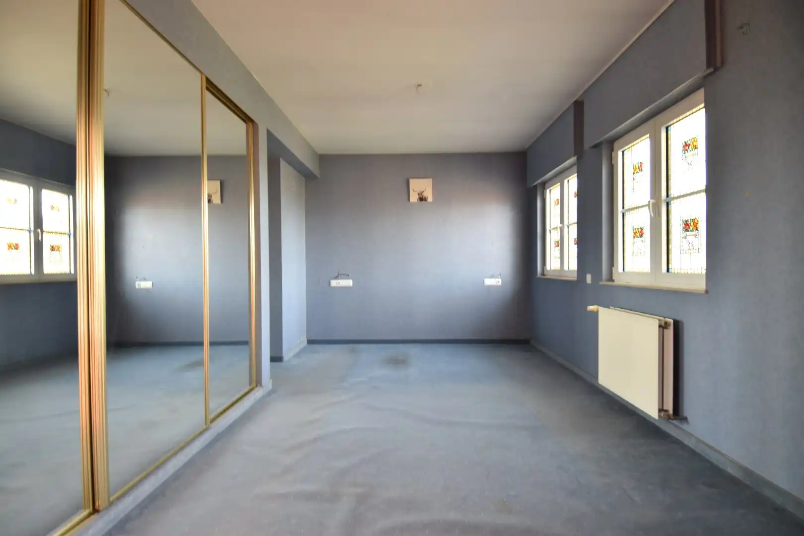 Statige woning met praktijkgedeelte (101 m²), 4 slaapkamers en zonnige tuin te koop in het straatbeeld van Bellegem foto 11