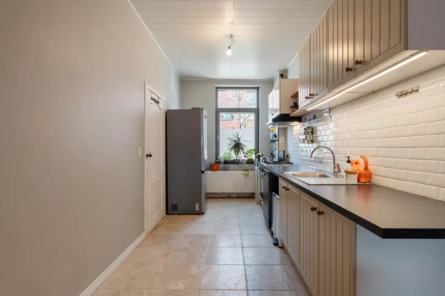 Goed gelegen halfopen bebouwing met 3 slaapkamers en een tuin met een poortje naar de straat te Wilsele! foto 13