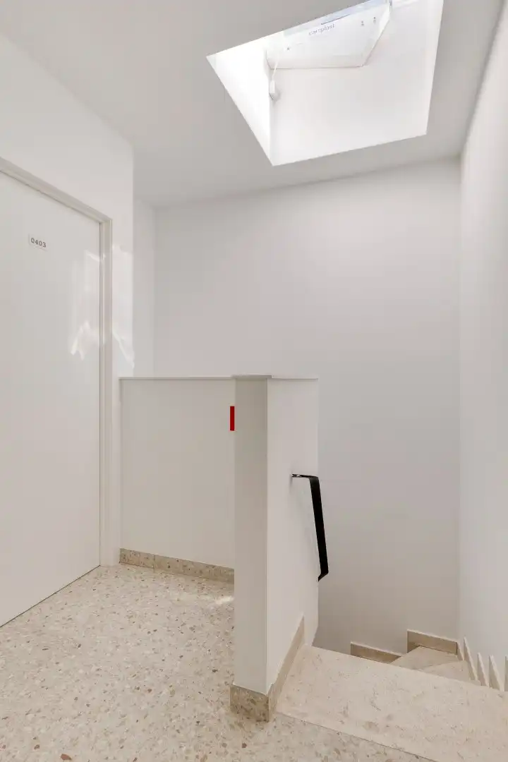 Volledig gerenoveerde studentenkamer in residentie met 15 studentenkamers en een 1slaapkamer appartement in hartje Leuven - EPC label A! foto 9
