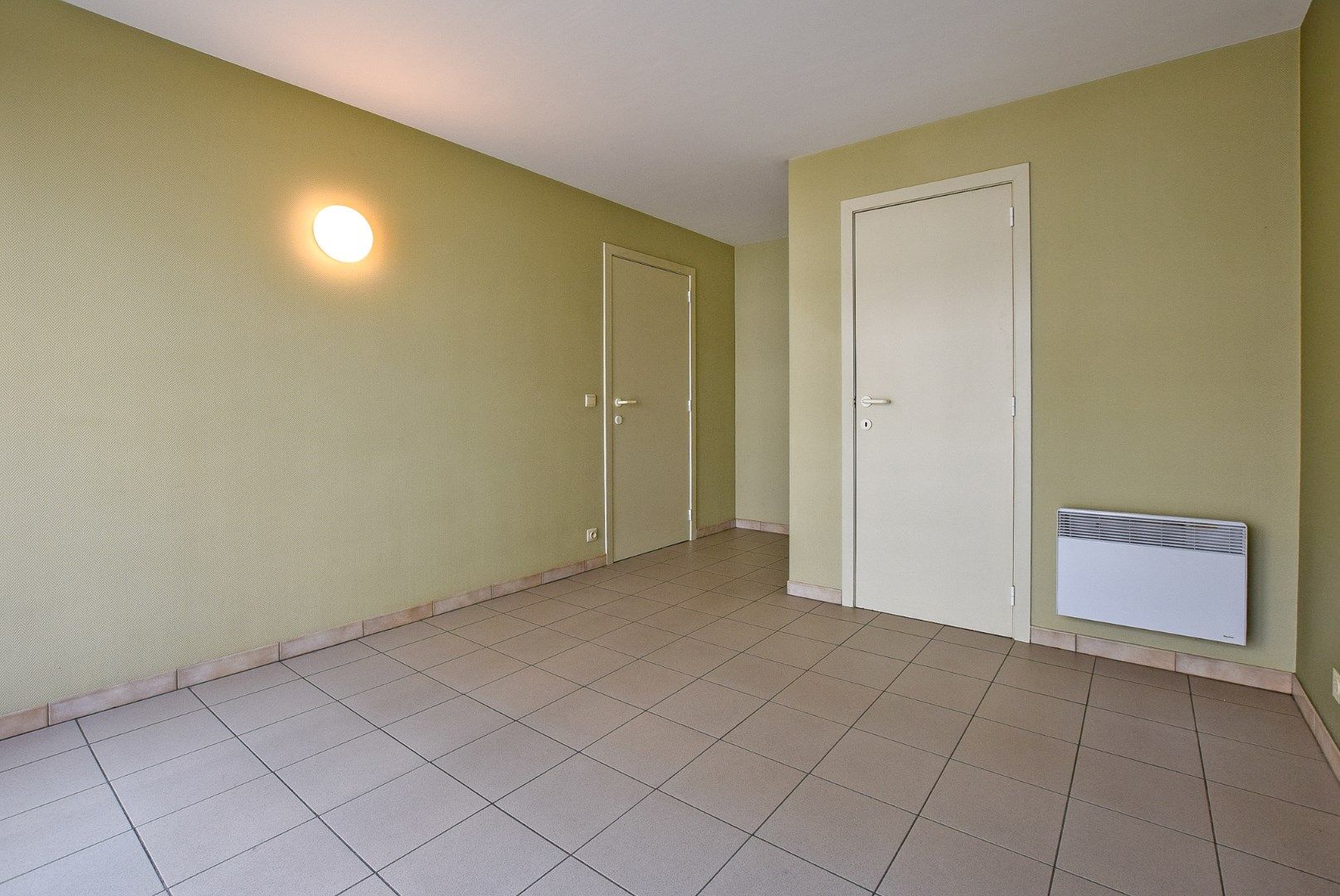 Goed gelegen 2-slaapkamerappartement te Oostduinkerke-Bad vlakbij de winkelstraat en het strand.  foto 13