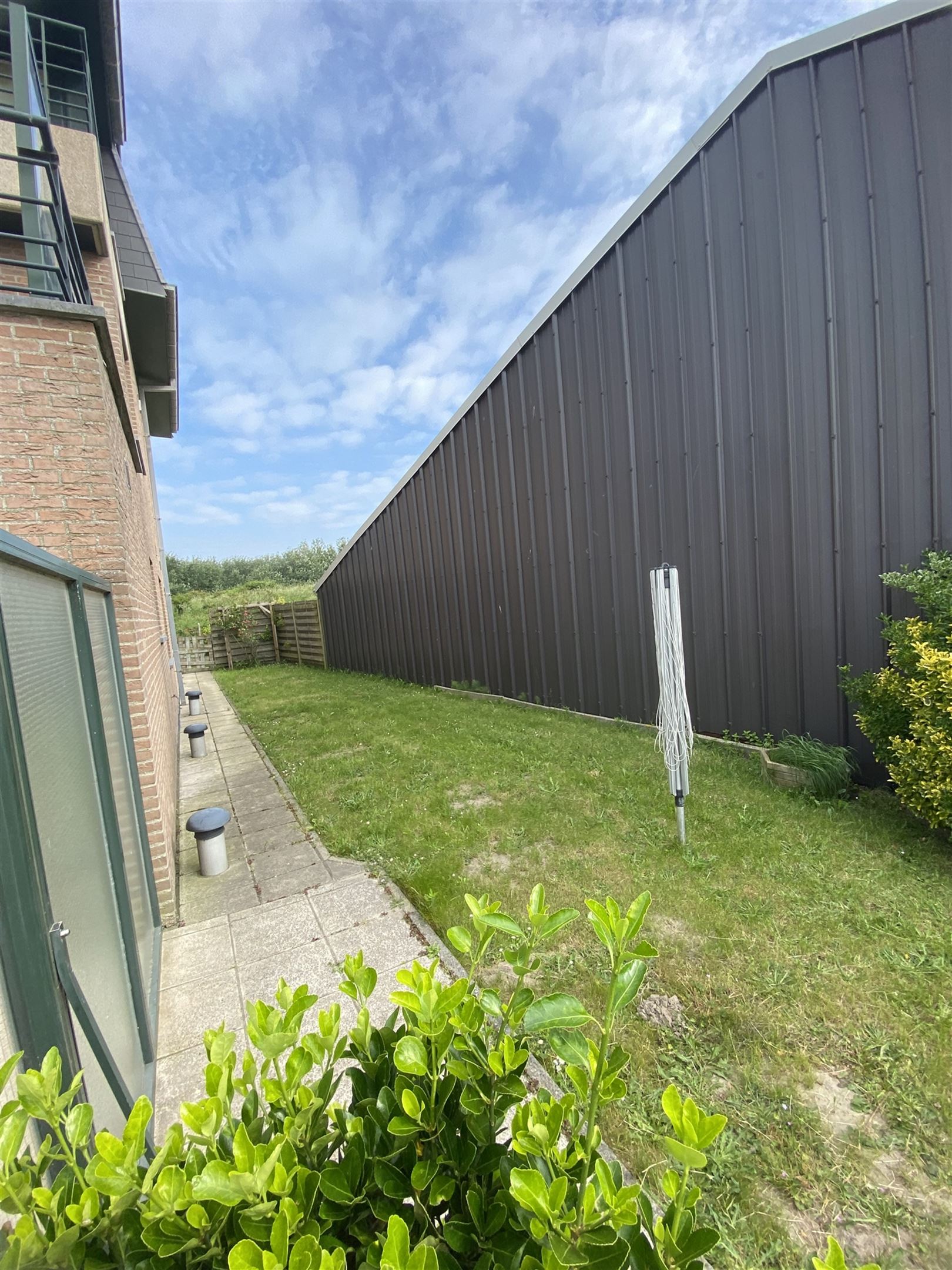 gelijkvloers appartement met garage foto 18