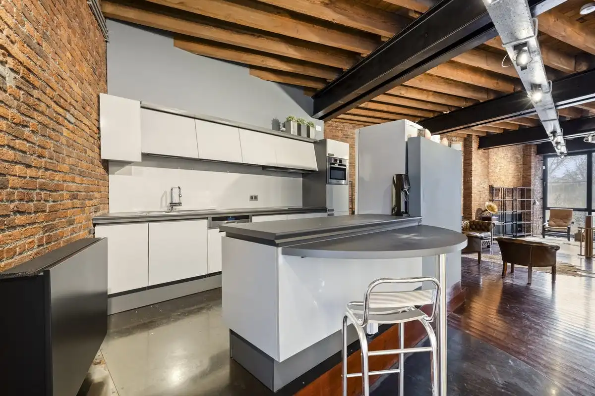 Industriële duplexloft met karakter in Gent foto 8