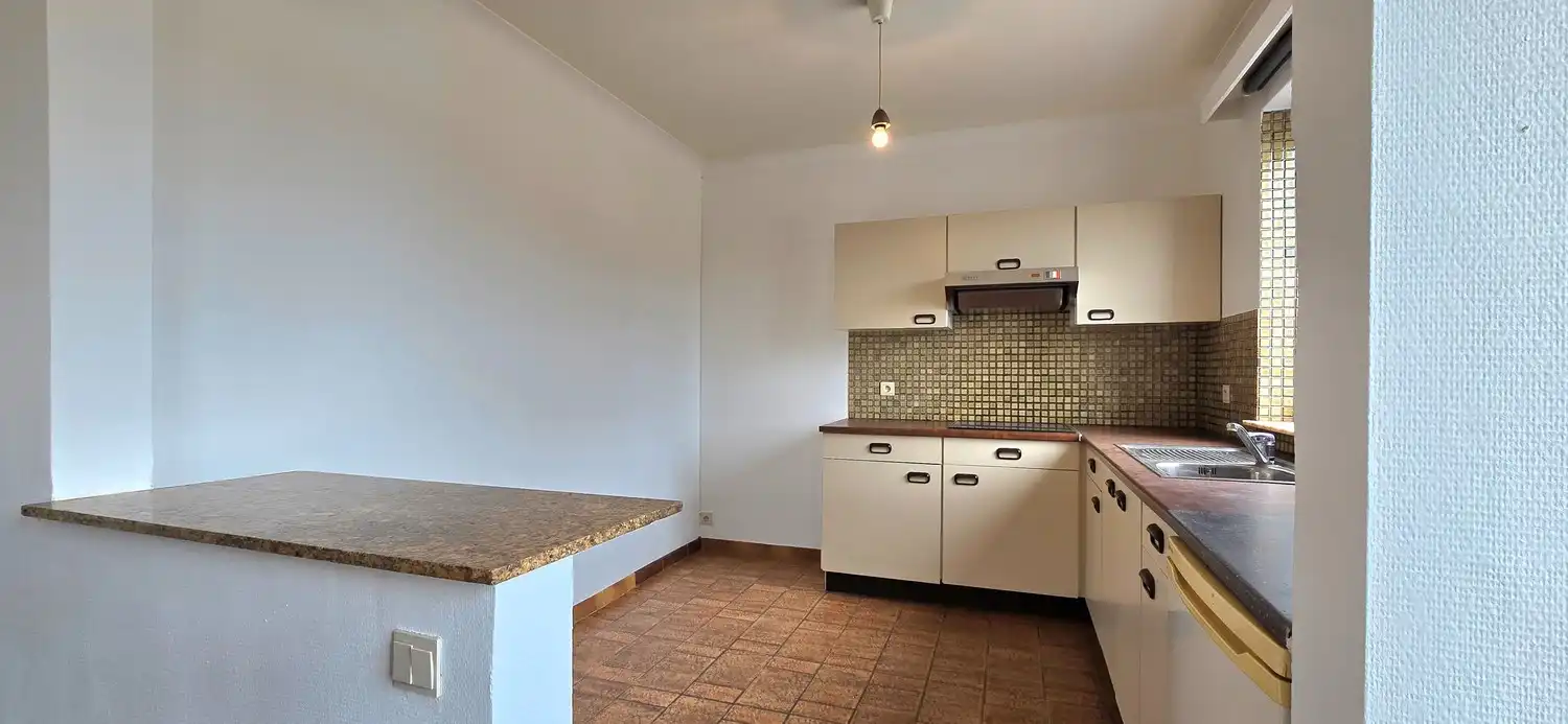 Instapklaar 2-slaapkamer appartement met garage, autostaanplaats en kelderberging foto 7