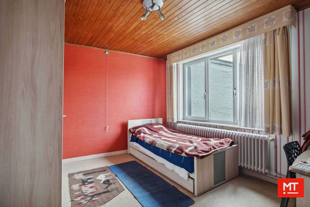 Veelzijdig gebouw bestaande uit handelsruimte, woning en appartement in het centrum van Wervik foto 16