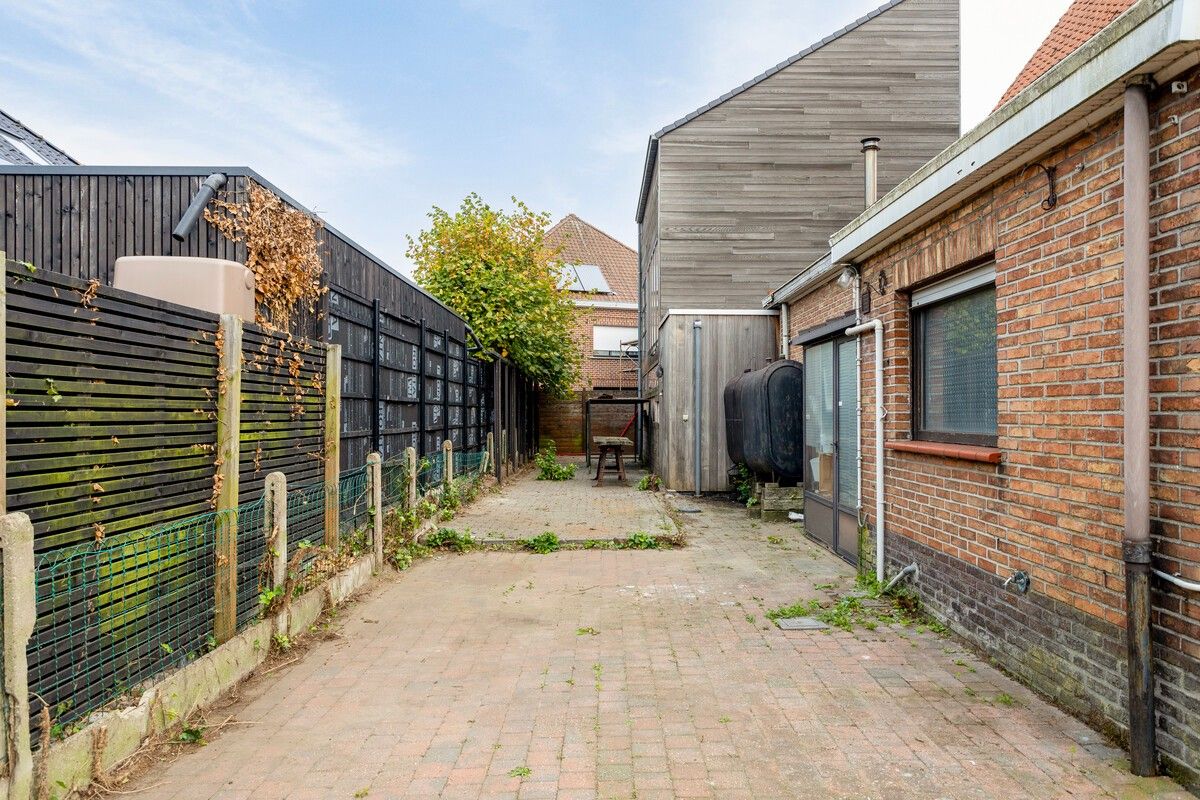Handelspand met woning in hartje van Sleidinge foto 27