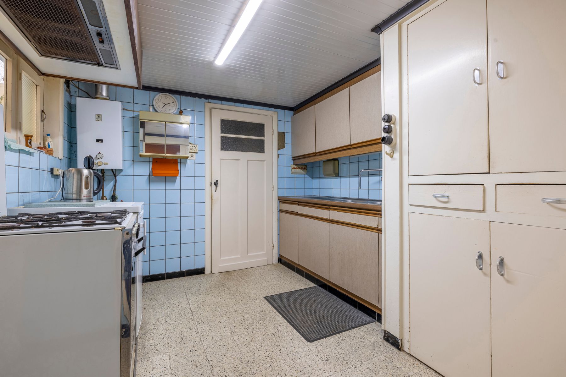 Te renoveren woning met tuin en 4 slaapkamers op toplocatie! foto 7