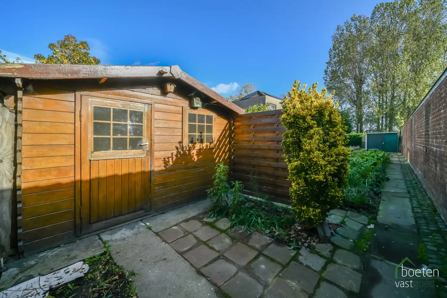 Alveringem: Interessante dorpswoning met redelijk comfort, 3 slaapkamers, tuin en uitweg met garage achteraan op 428m² grondopp. foto 20