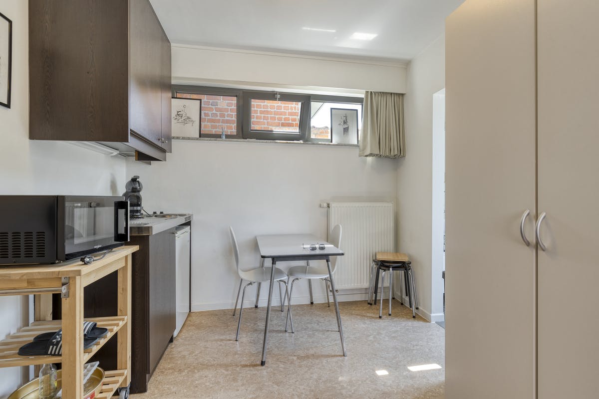 Uniek pand met appartement en 3 studentenkamers in Sint-Michiels foto 17