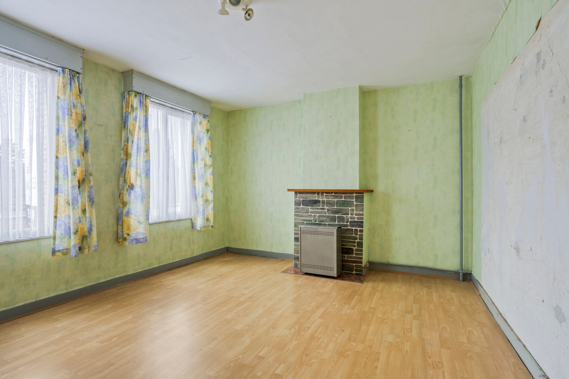 Charmante te renoveren woning met tuin en optionele garage foto 14