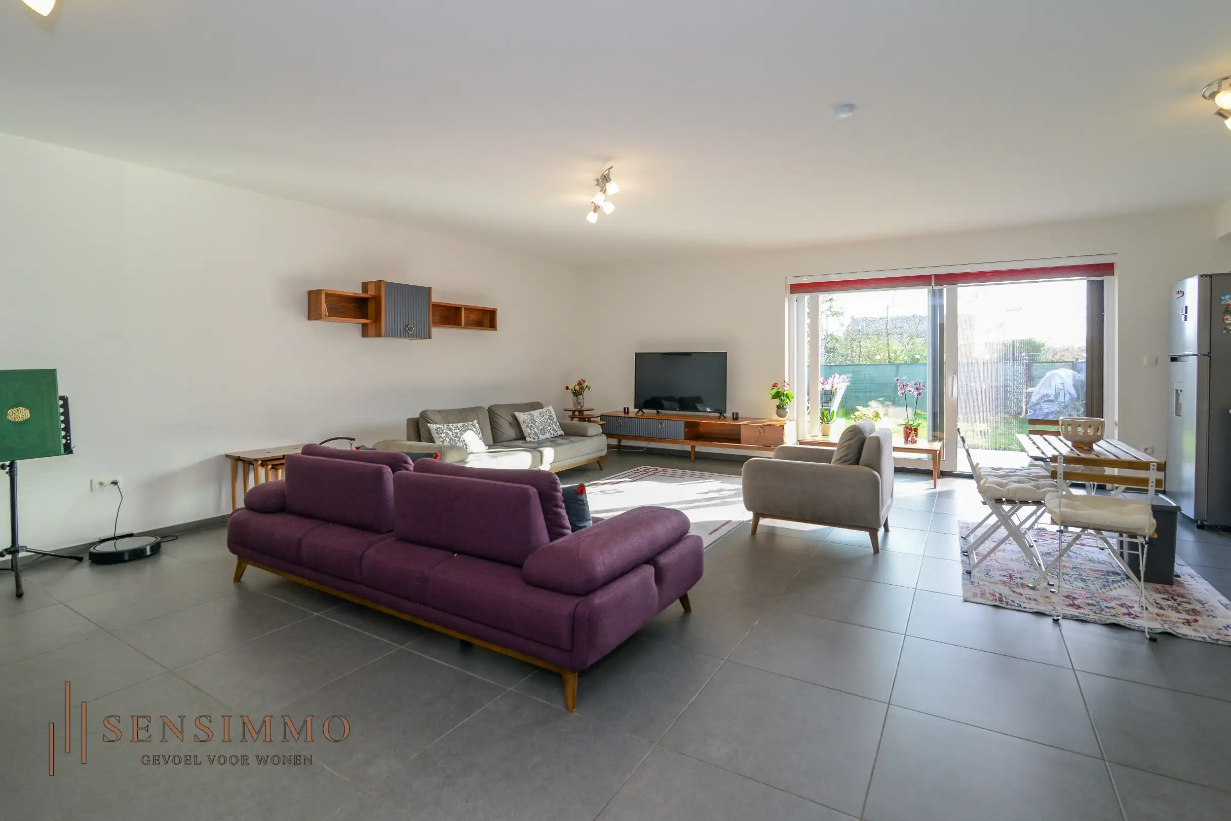 Gelijkvloers tweeslaapkamer appartement van 110m² met tuin, parking en kelderberging foto 6