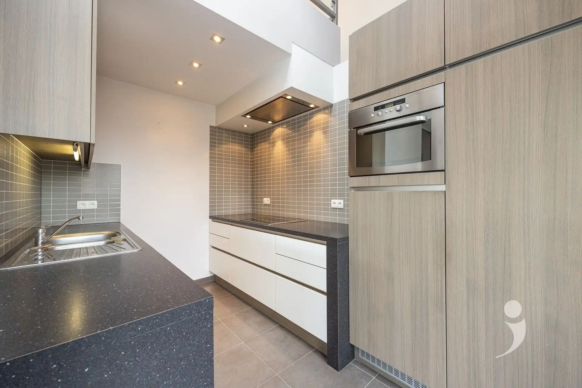 Zeer ruim duplexappartement in hartje Herent! foto 4