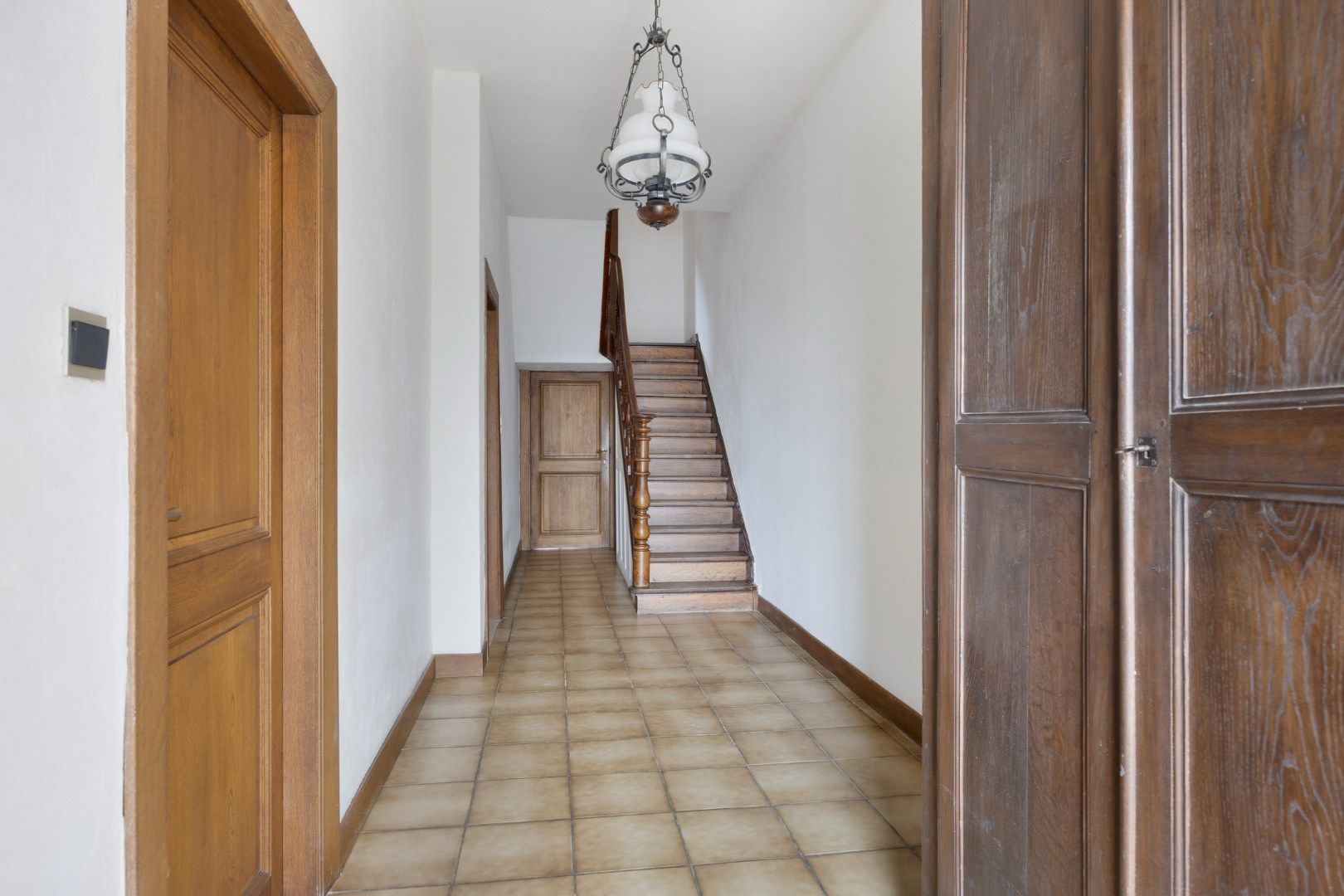 Woning met veel woonoppervlakte, zolder, garage en tuin te Tongeren-Lauw foto 4