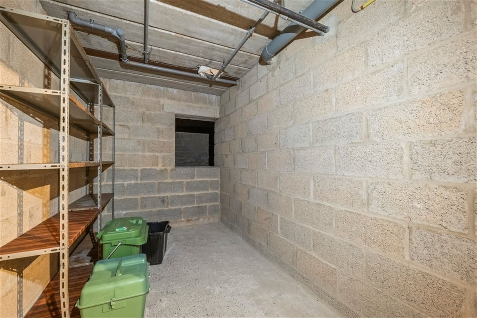 OPBRENGSTEIGENDOM MET 6 APPARTEMENTEN EN 4 STAANPLAATSEN IN SINT-TRUIDEN  foto 12