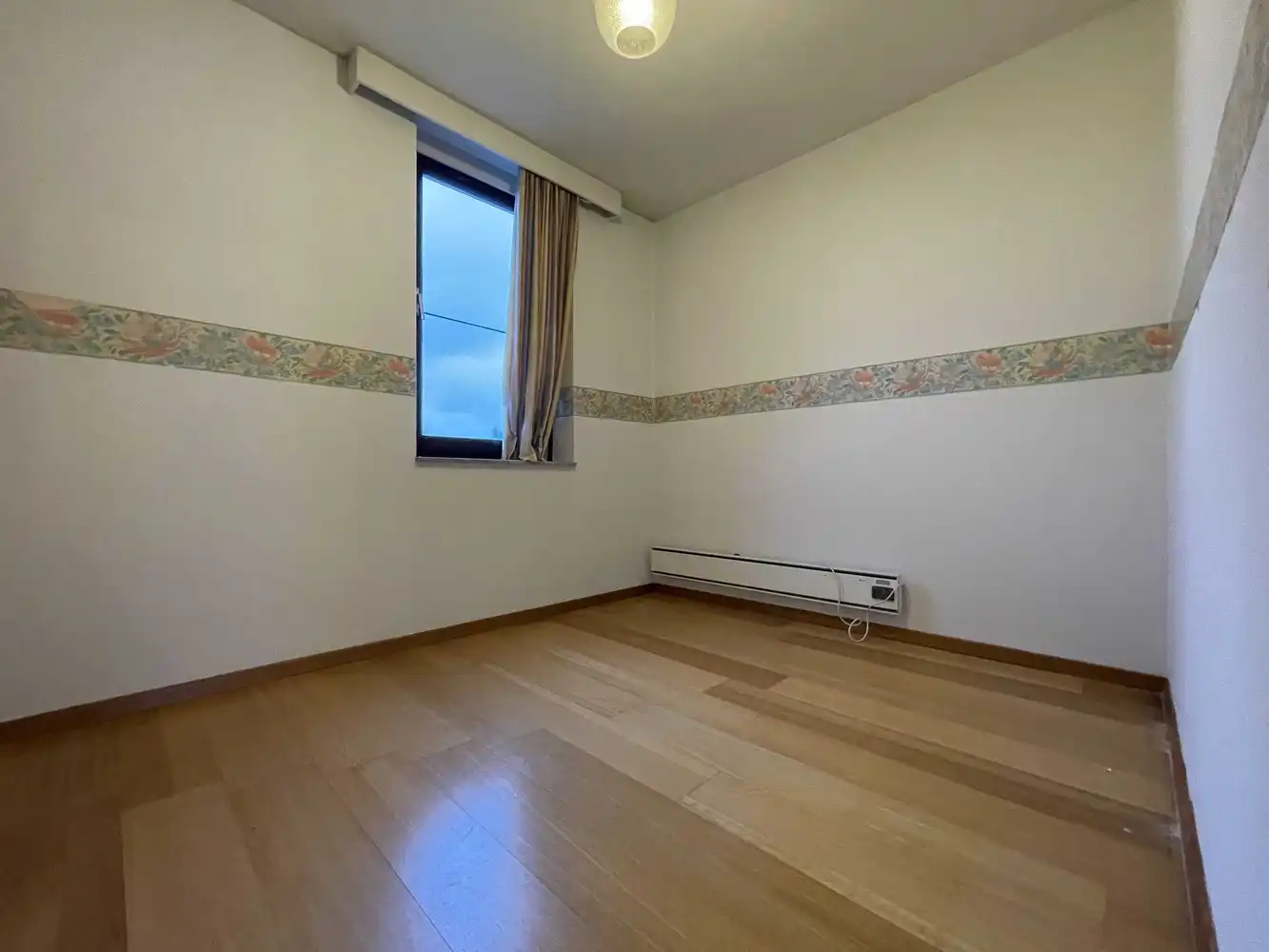 Goed gelegen drieslaapkamerappartement met garage foto 11