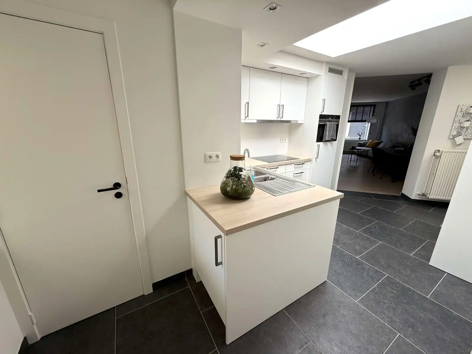 Recent gerenoveerd en volledig gemeubeld rijhuis met tuin te huur foto 9