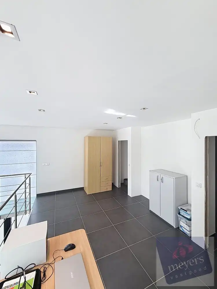 Ruime instapklare woning met praktijkruimte in Spalbeek foto 16