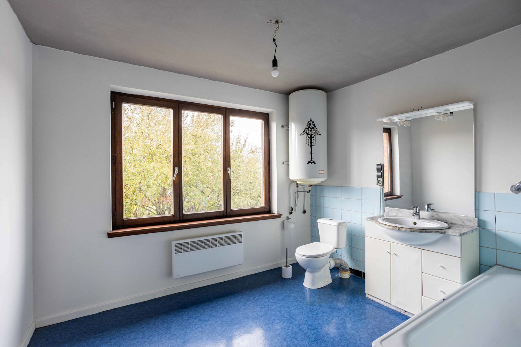 Gesloten bebouwing met garage en drie slaapkamers.  foto 14