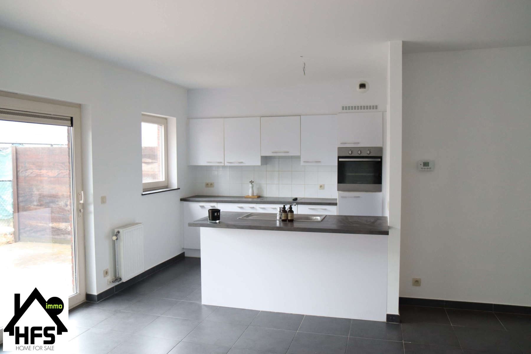 Rustig gelegen gelijkvloers appartement met zonnig ruim terras met staanplaats foto 2