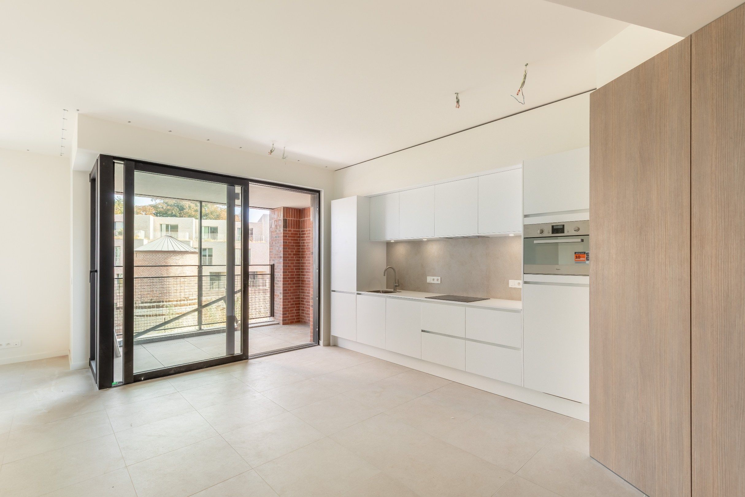 Nieuwbouw één-slaapkamer appartement foto {{pictureIndex}}