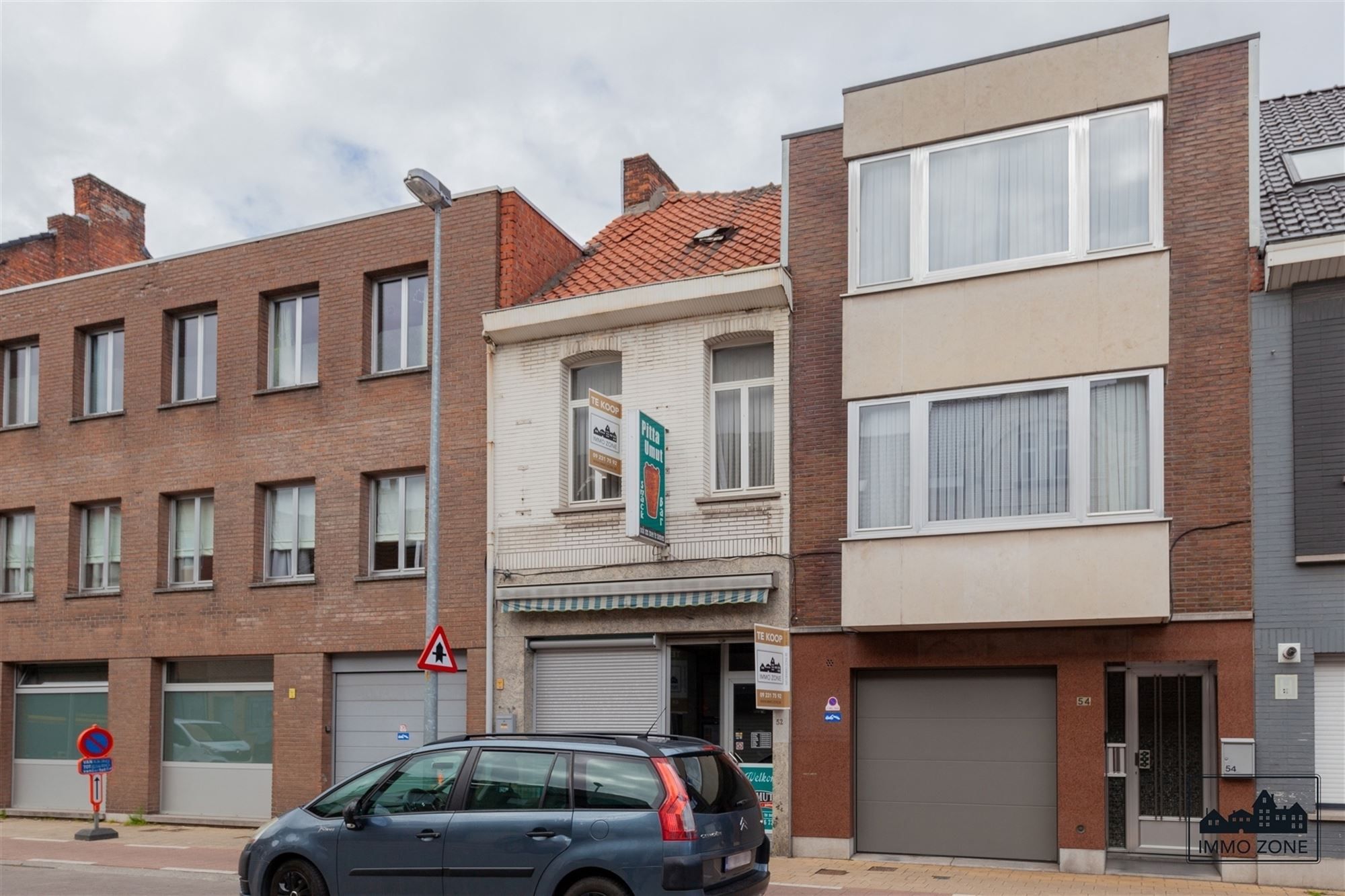 Gunstig gelegen rijwoning met handelsruimte foto 22