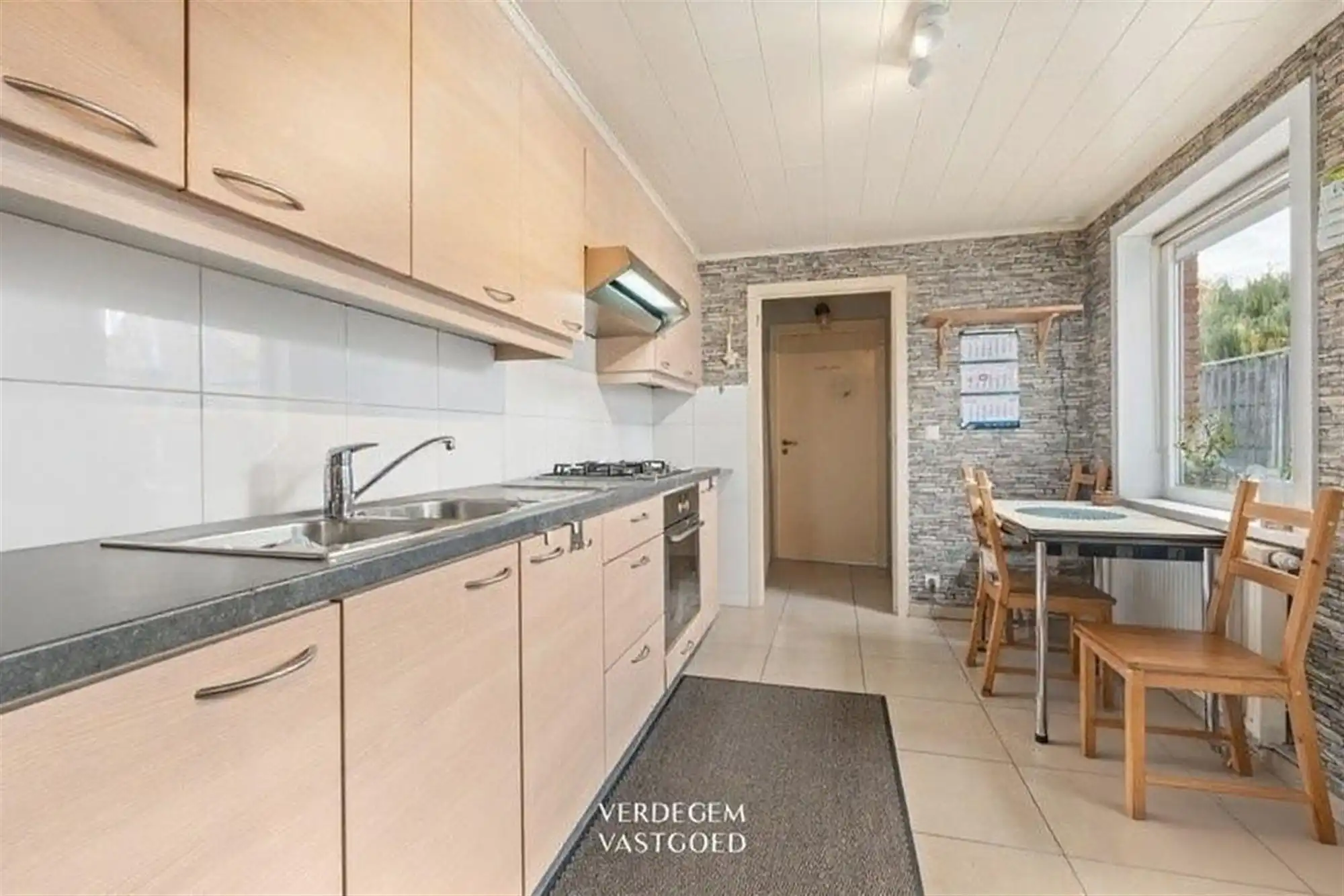 Wonen aan het Leopoldskanaal: gerenoveerde woning met 2 slaapkamers, tuin en terrasje foto 4