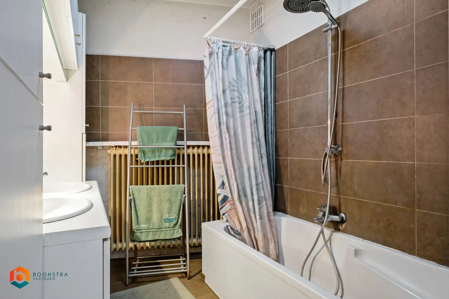 Handelspand met bovengelegen woonst pal in het centrum van Putte! foto 19