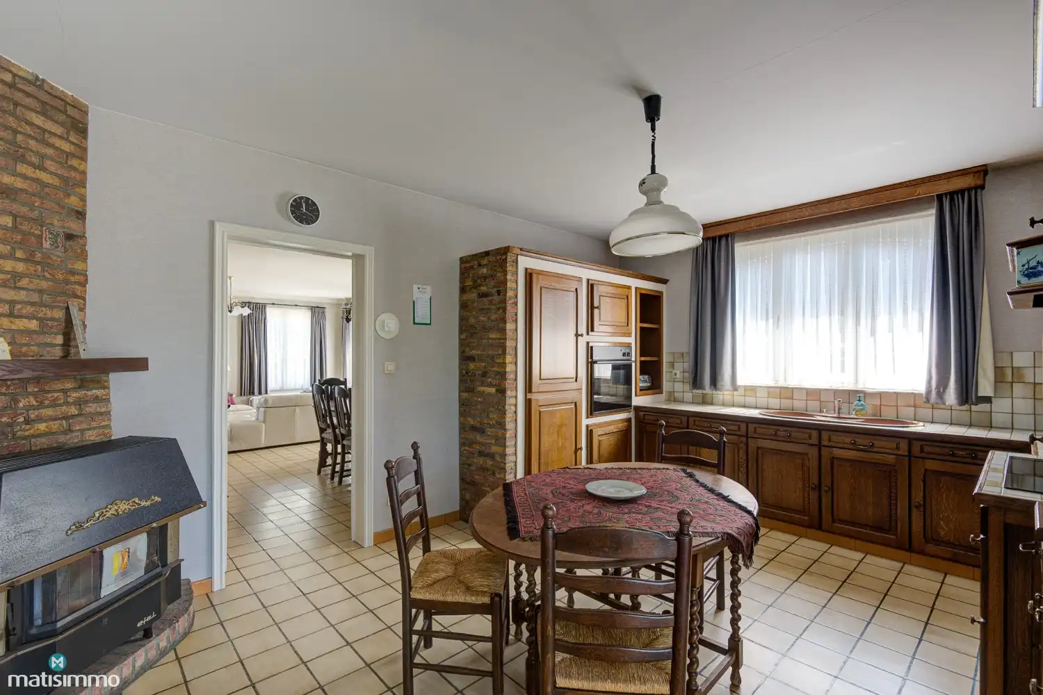 VERZORGDE EN VOLLEDIG GELIJKVLOERS INGERICHTE GEZINSWONING MET 3 SLAAPKAMERS EN TUIN IN RIEMST foto 9