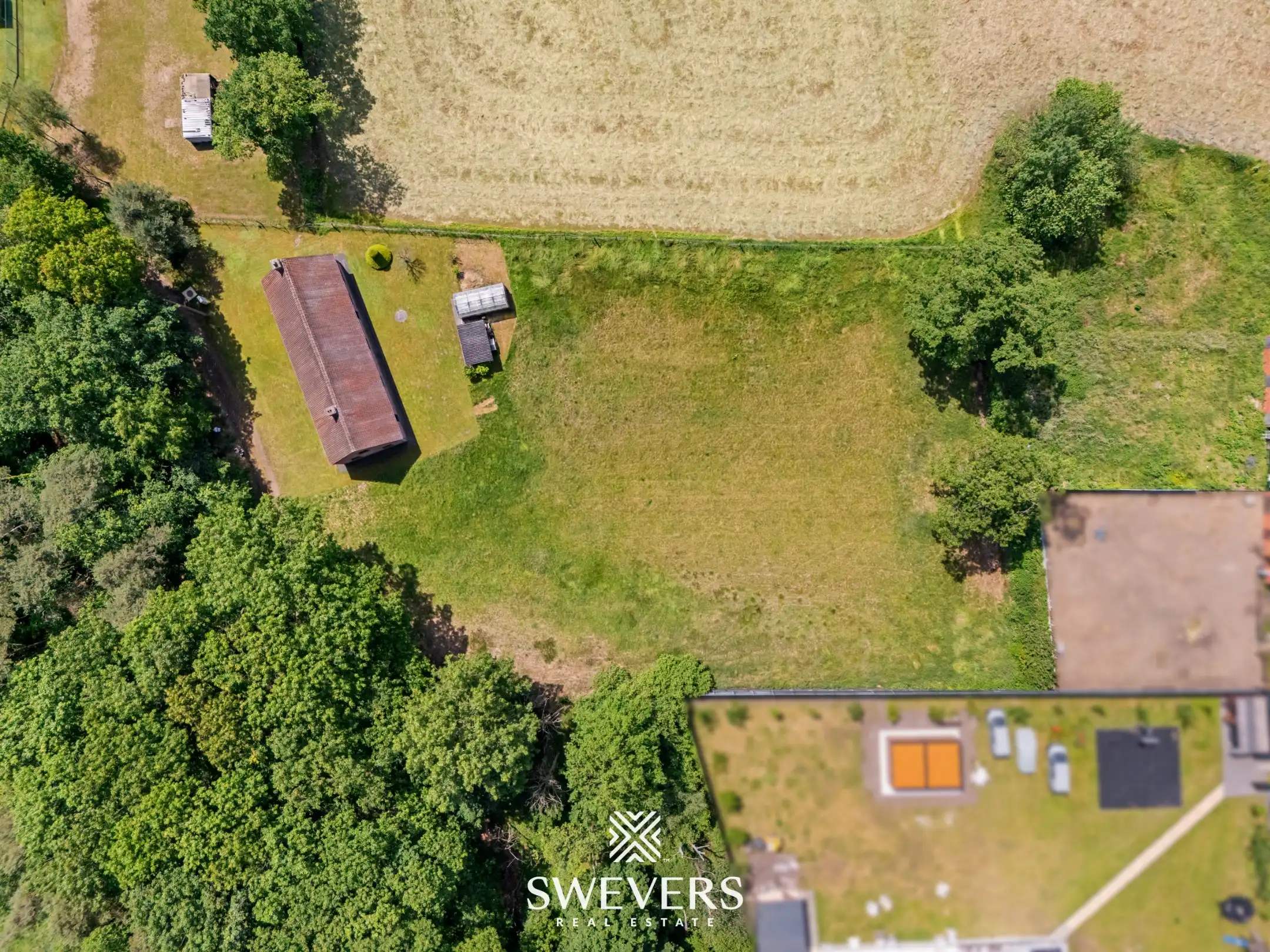 Open bebouwing op 4.010 m² rustig gelegen met flexibele indeling en sterke bouw in Paal foto 33