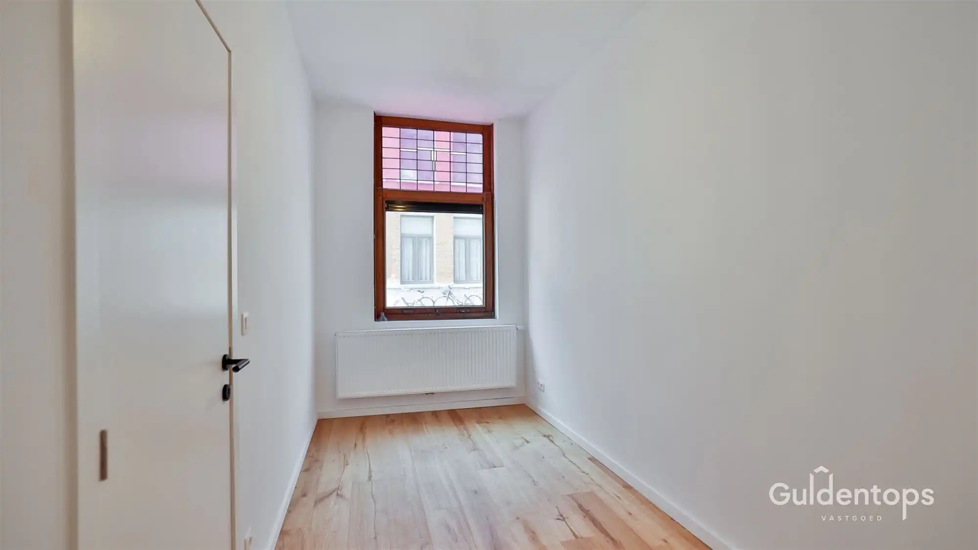 Knap gelijkvloers appartement in hartje Lier met grote tuin foto 8