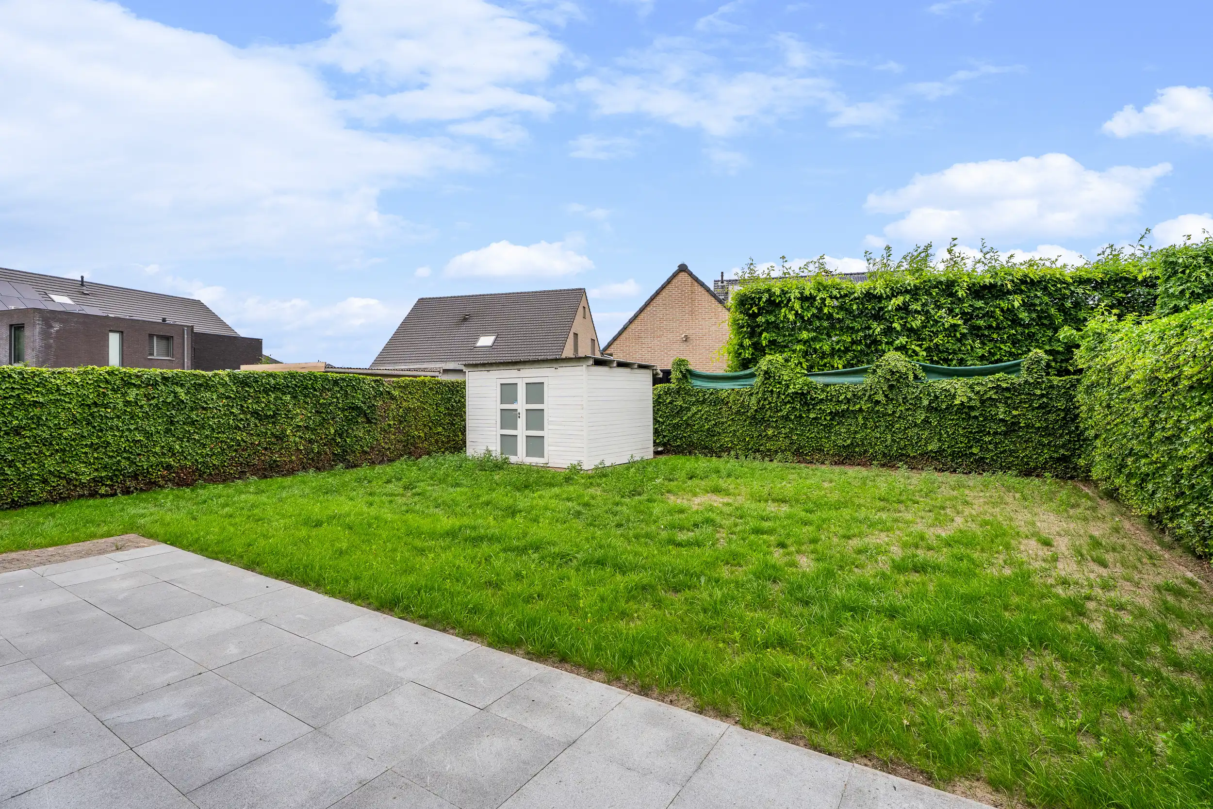 Moderne en energiezuinige gezinswoning in hartje Lochristi foto 12