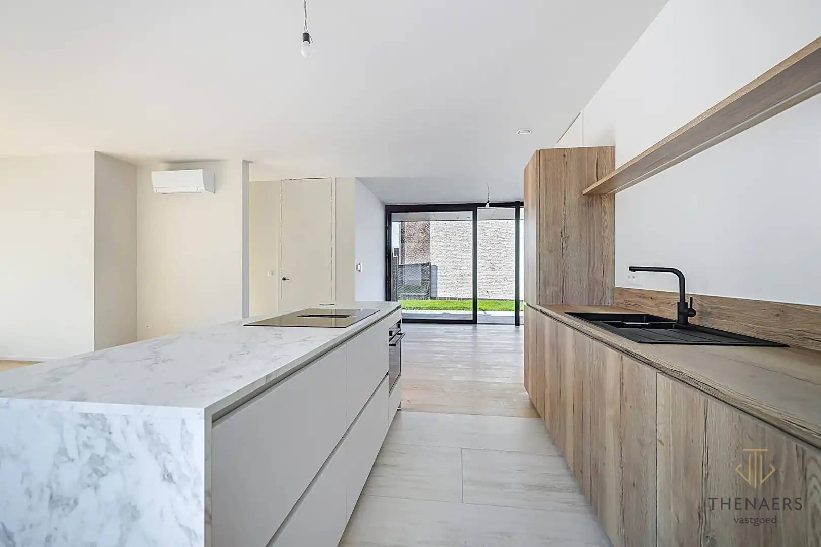 Strakke en luxueus gerenoveerde open bebouwing met hoogwaardige afwerking en EPC A in Wilderen. foto 11