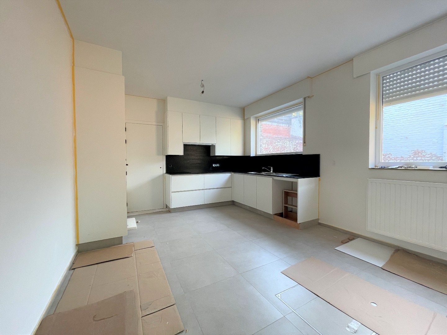 Gerenoveerde halfopen bebouwing met 3 slaapkamers en garage in centrum Roeselare  foto 3