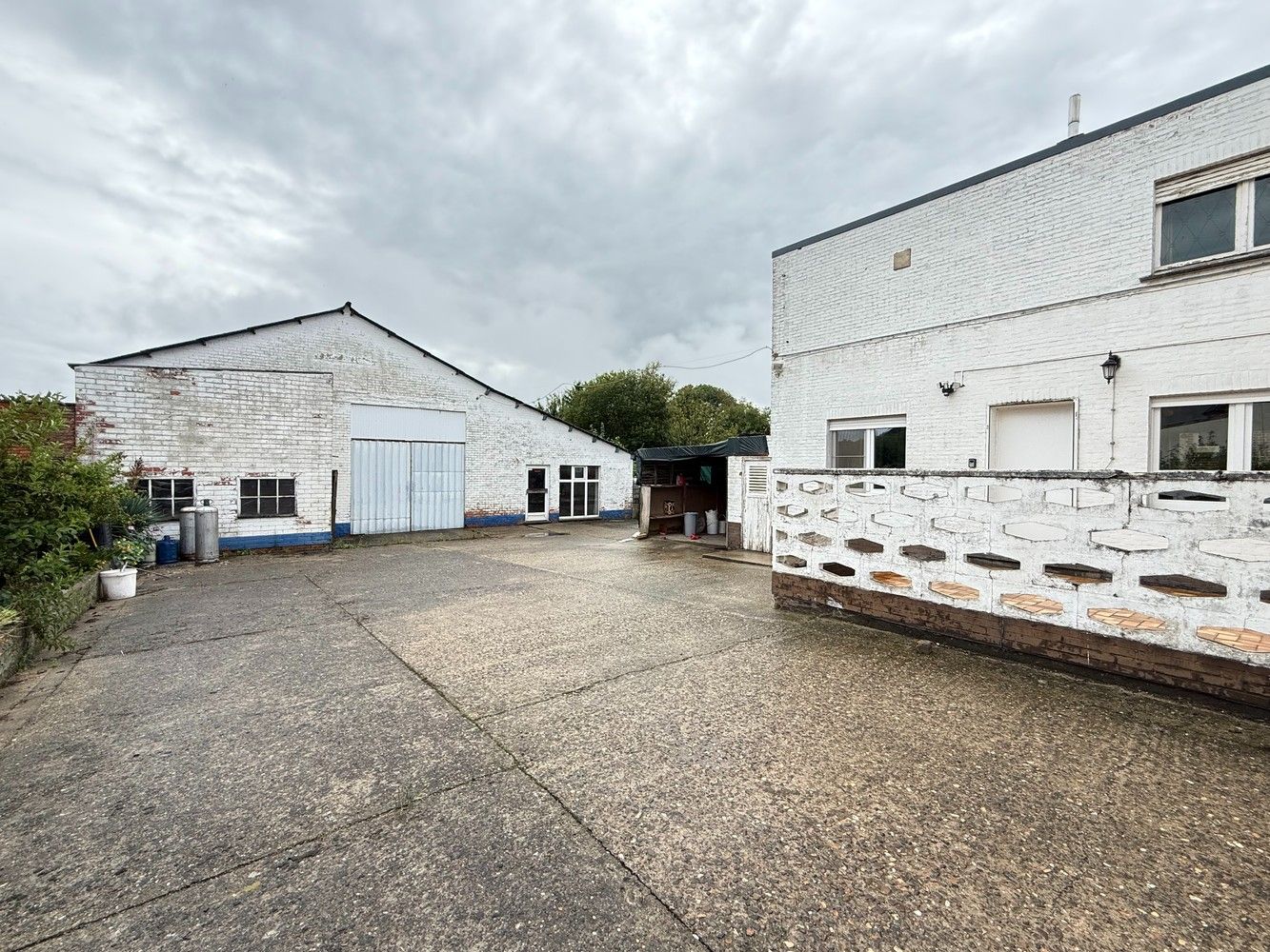 Woning met achterliggend magazijn op 15 are 29 ca. foto 18