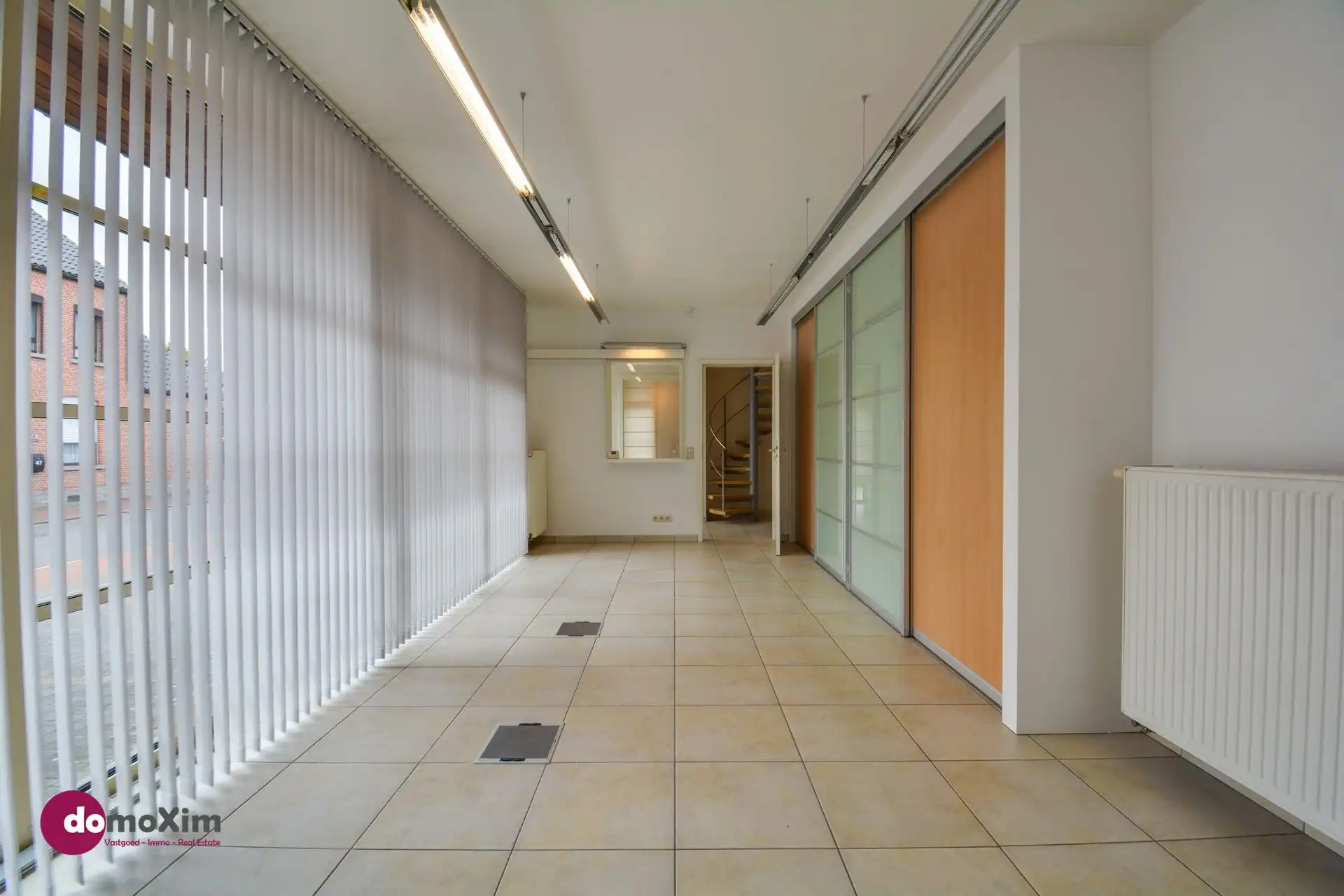 Ruime woning met kantoorruimte in het centrum van Hever foto 4