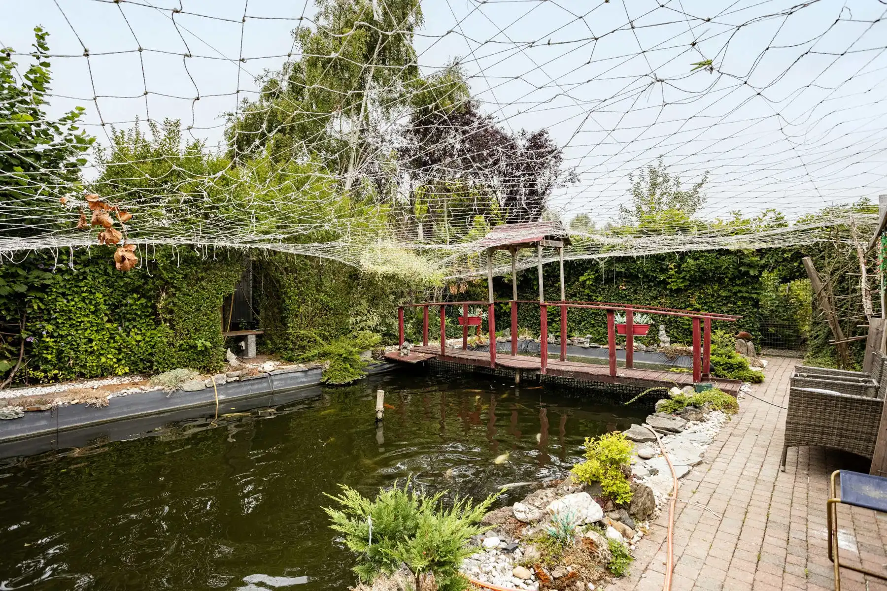 Leuke half-open bebouwing met grote tuin! foto 17