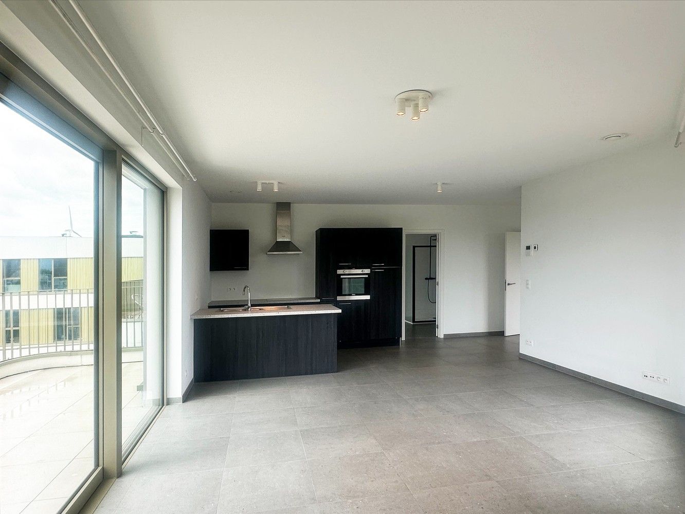Zeer knap BEN nieuwbouwappartement op de 5de verdieping met fantastisch zicht op de Rupel! foto {{pictureIndex}}