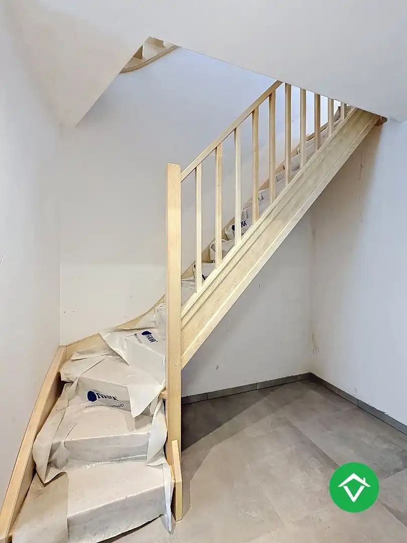 Centraal gelegen nieuwbouwwoning met 3 slaapkamers, tuin en overdekte autostaanplaats foto 14