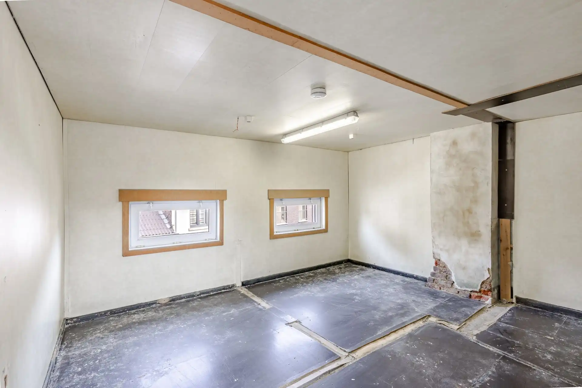 Handelspand met uitstekende visibiliteit en tal van mogelijkheden nabij het centrum van Aalst foto 19